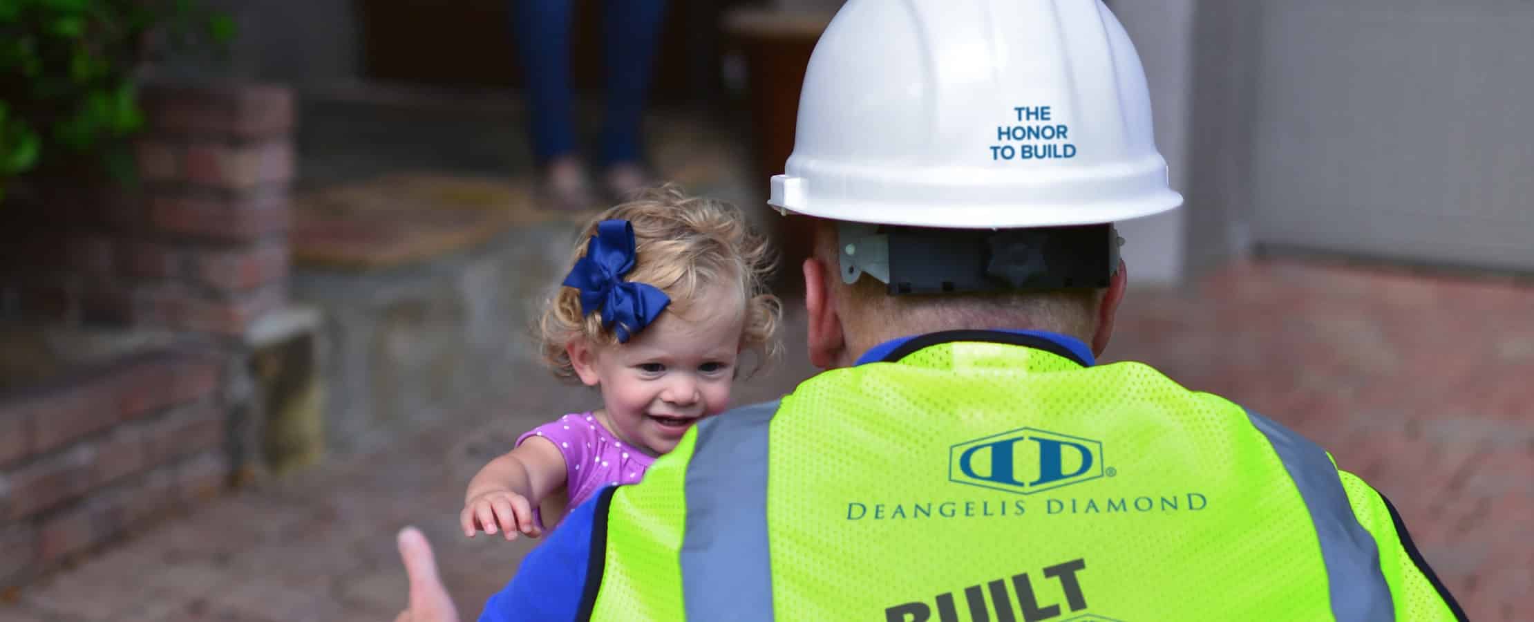 Safety at the core_construction worker with his daughter